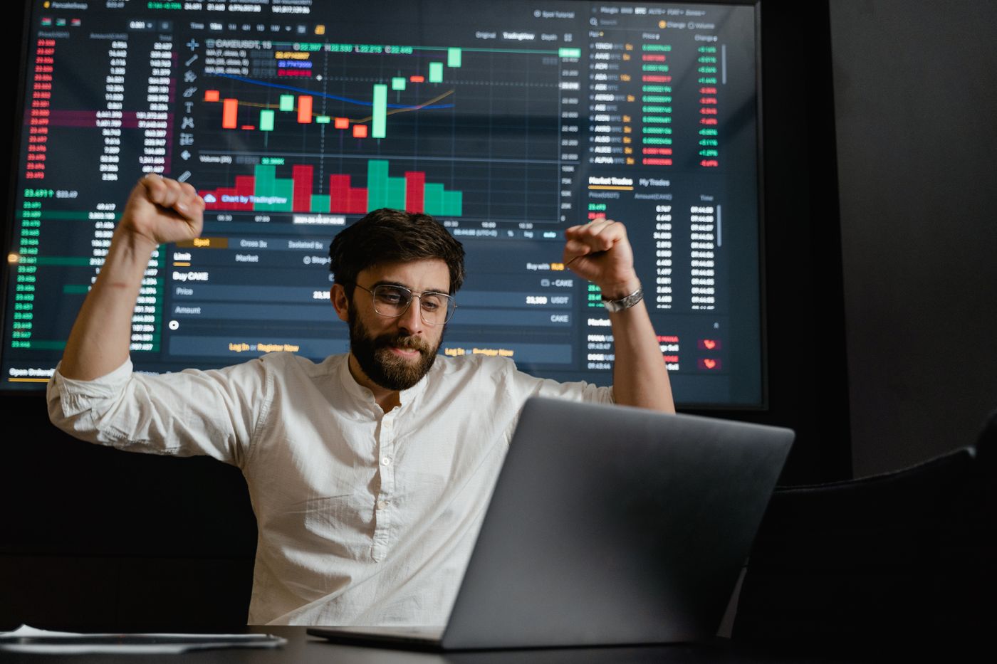 Business operator reviewing sales analytics on a laptop dashboard